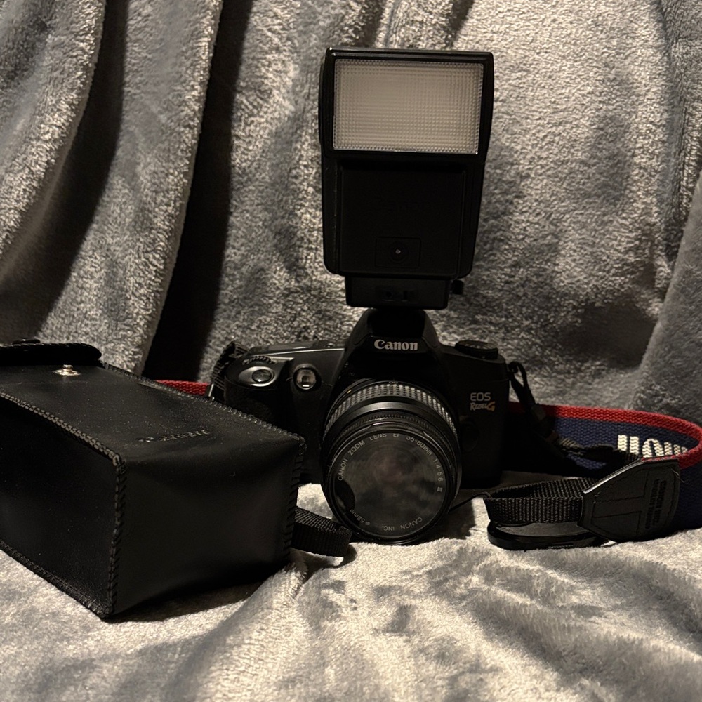 Canon Black EOS Rebel G Camera with Flash Attachment (film)